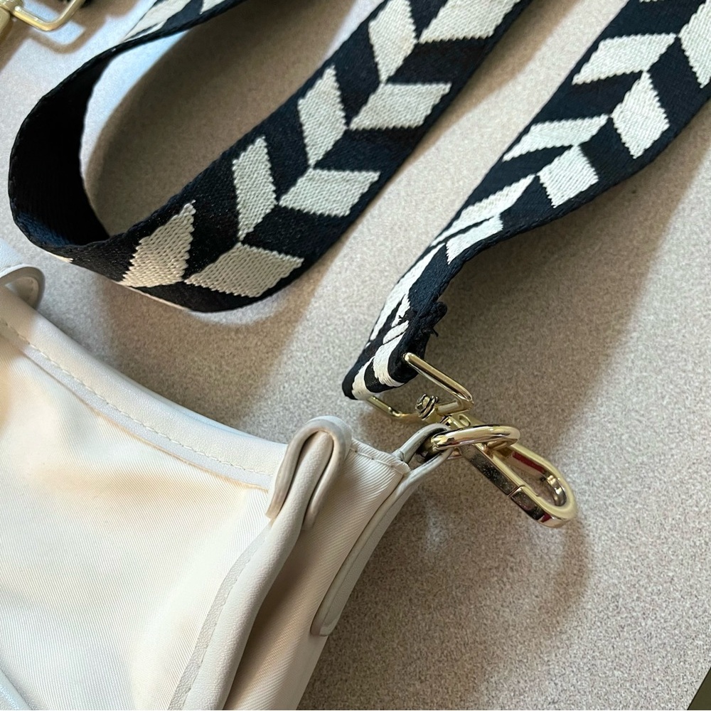 Stylish Cream Crossbody Bag with Patterned Strap